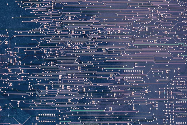Close up of a blue printed circuit board for a computer. Technology device concept.
