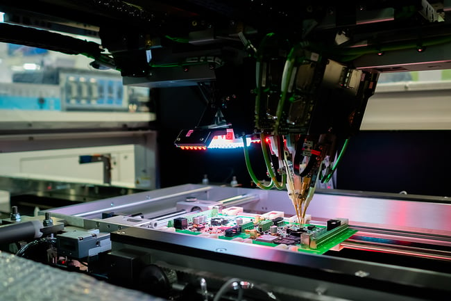 machine manufacturing a printed circuit board
