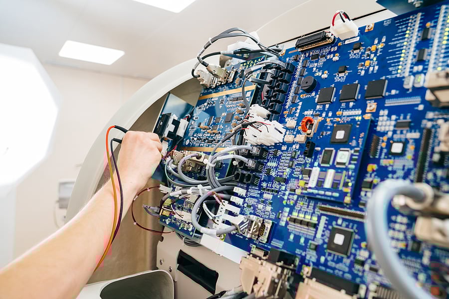 Electronic components of a large medical device.