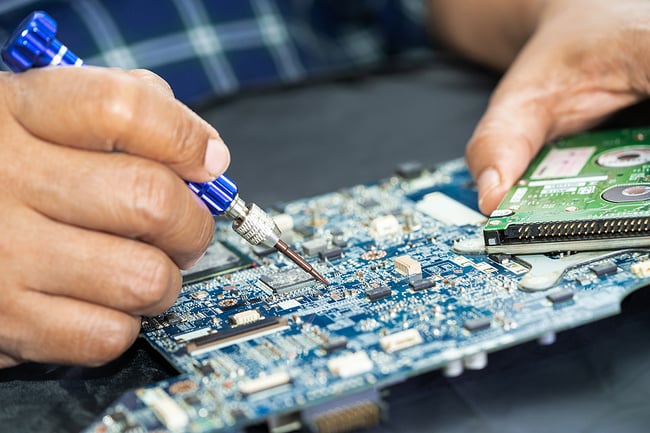 ECM fixing a PCB.