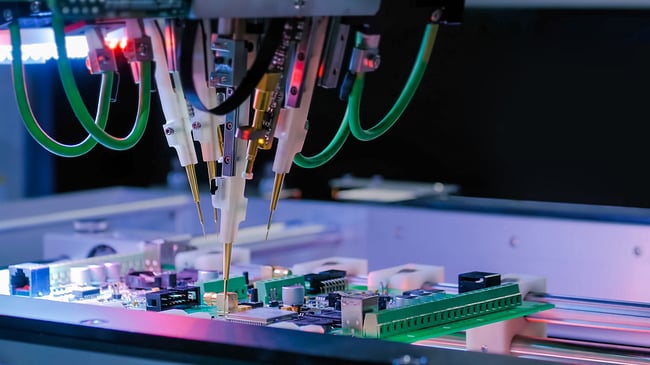 machine manufacturing a printed circuit board