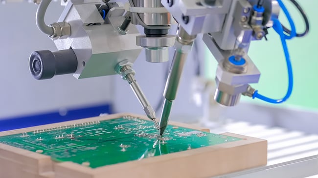 Close up photo of robotic printed circuit board assembly.