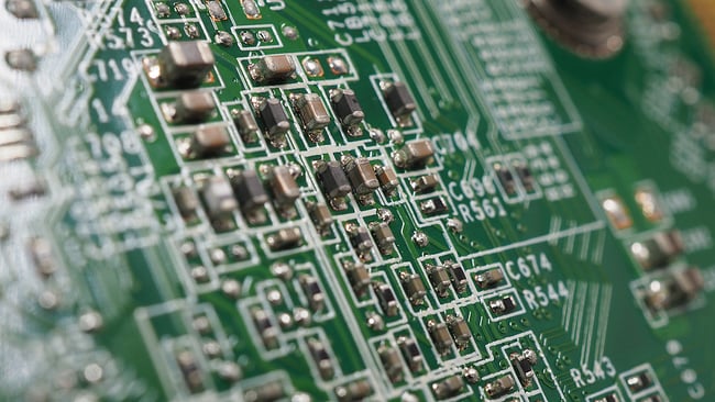 Green PCB close up photo of circuits.